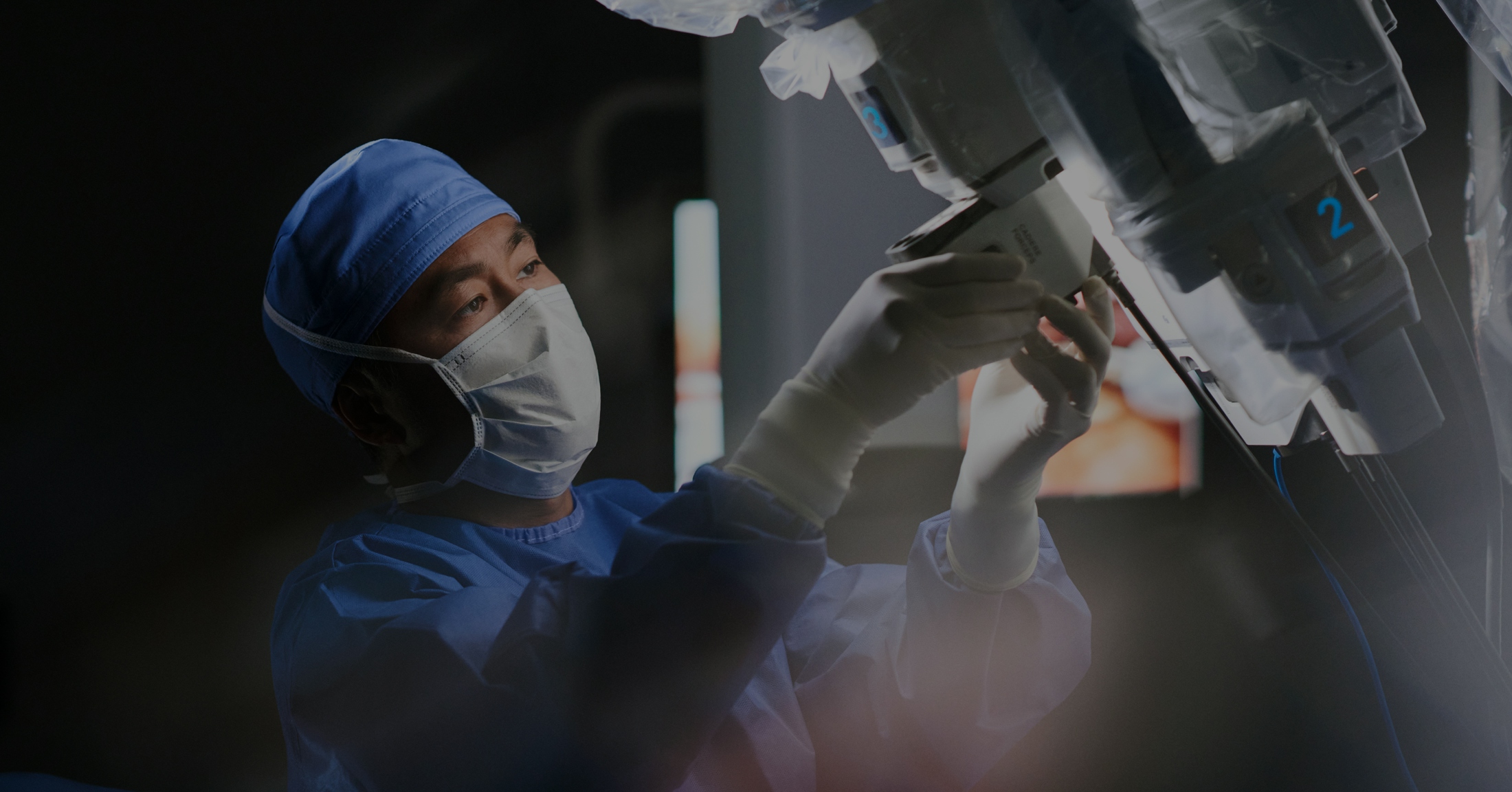 Surgeon replacing an instrument on a da Vinci system